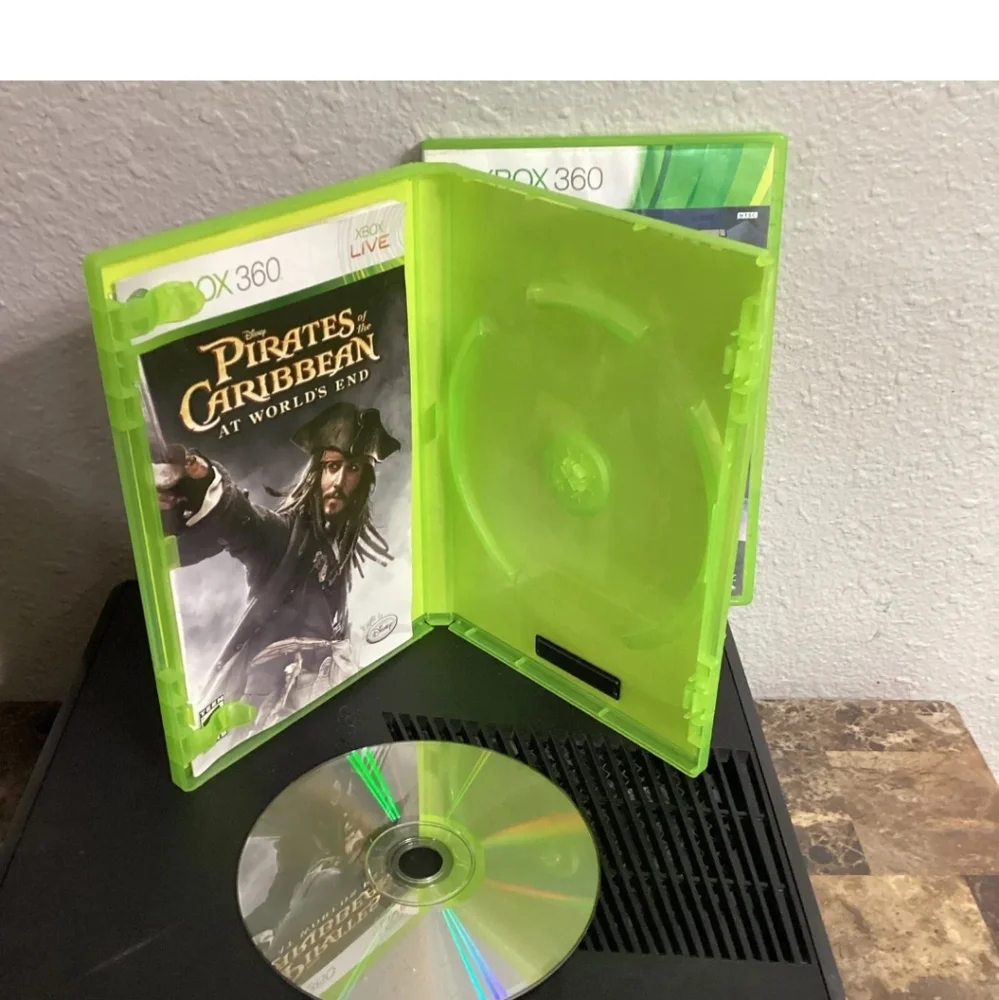 Microsoft Xbox 360 Game Console Bundle 4GB, Power Cord, Controller, and 2 games.